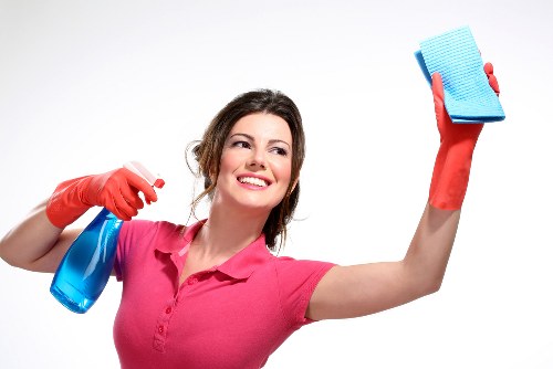 Technician carrying out upholstery stain treatment in Edgware